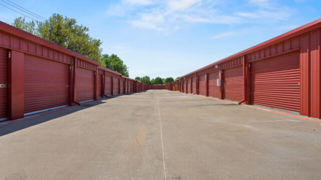 aisle of drive-up storage units at Storage Depot in Flower Mound, TX