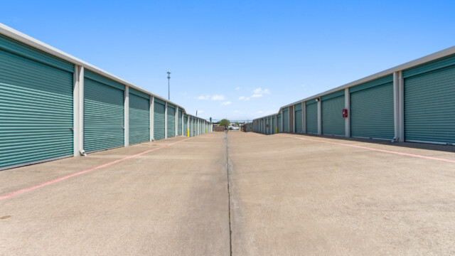 aisle of drive-up storage units at Storage Depot in Wylie, TX