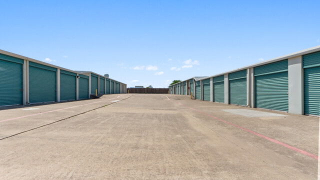 aisle of drive-up storage units at Storage Depot in Wylie, TX