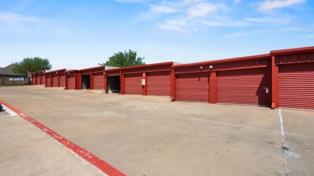 row of drive-up storage units at Storage Depot in Flower Mound, TX