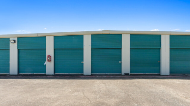 row of drive-up storage units at Storage Depot in Wylie, TX